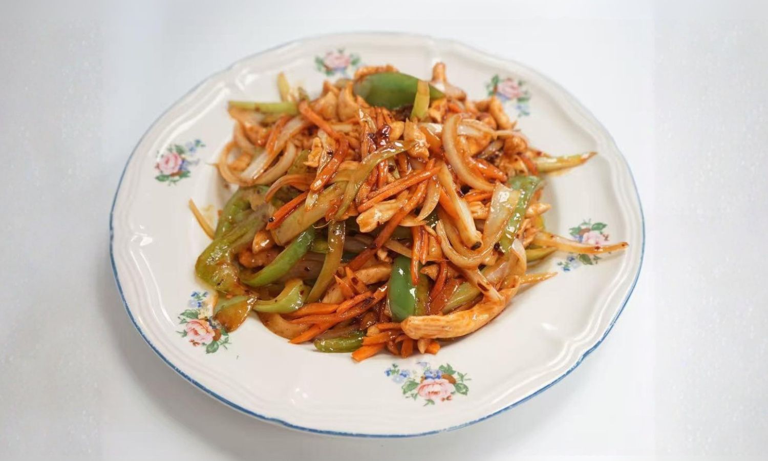 Shredded chicken with bell peppers and carrots in spicy sauce at Peking Gourmet, a Chinese Restaurant in Frederick