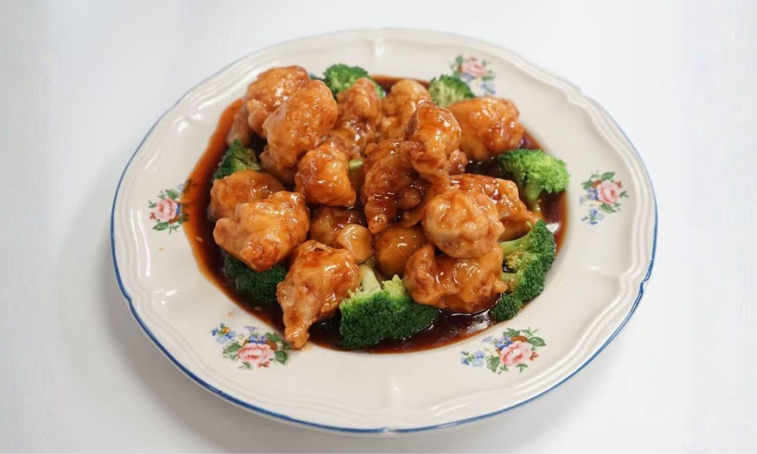 Crispy chicken in spicy-sweet sauce with broccoli at Peking Gourmet, a Chinese Restaurant in Frederick